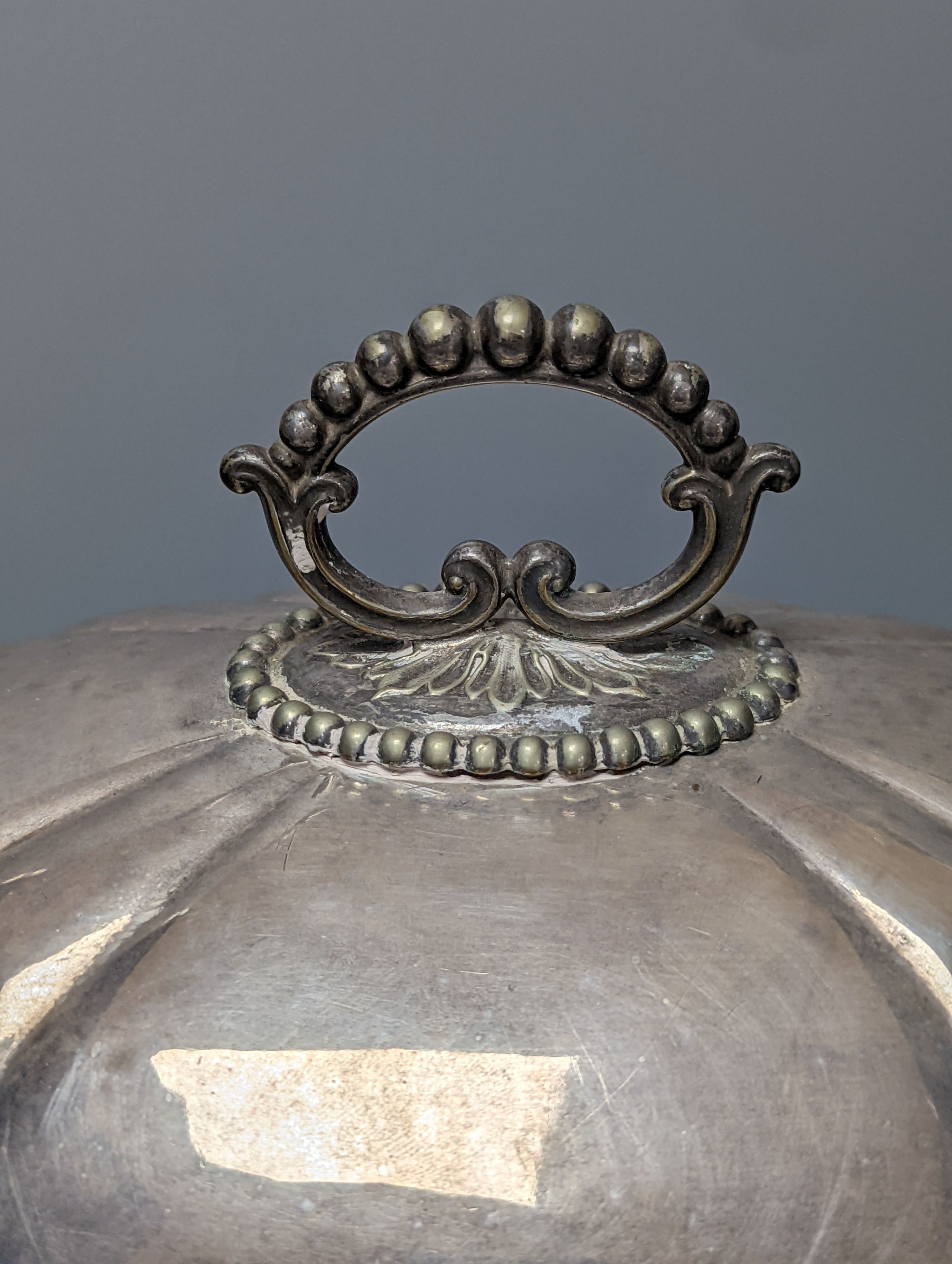 A silver plated meat dome and a similar hot water dish, 46cm